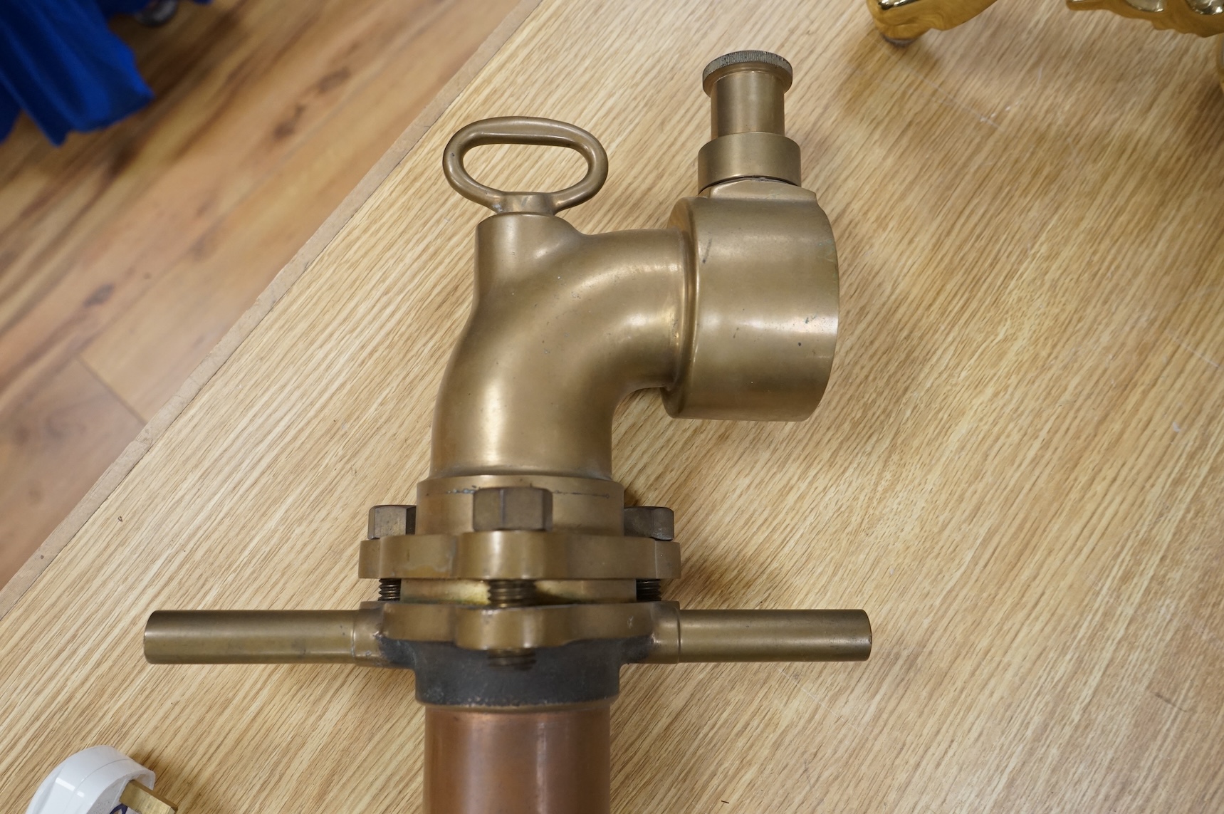 A brass ship's compass in gimbal and a copper water hydrant, 95.5cm